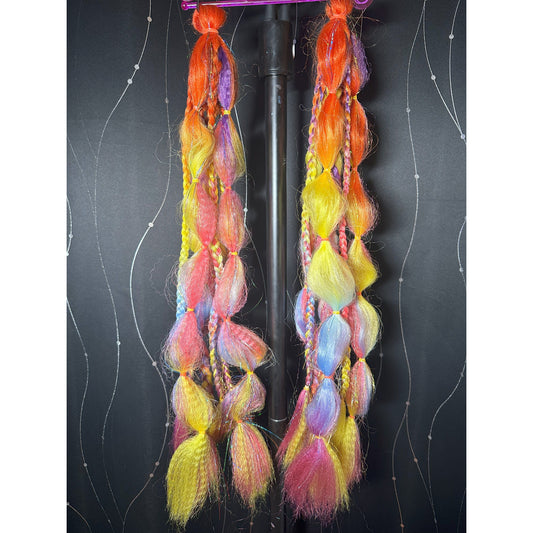 This handmade set by Jessica is 22 inches long, 7 pieces per pony, 2 ponytails - Orange, Purple, Coral, Light Blue, Pink & Neon Yellow ombre hair with multicolor tinsel. Each pony has braids, twists and bubbles! Used once, simply run straightener over the wavy parts and mold bubbles as you desire